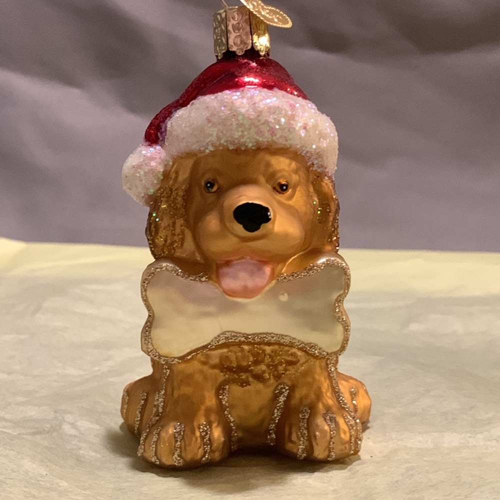 golden retriever Old World Christmas ornament/golden doodle with Santa Claus